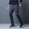 The original manufacturer offers spring and autumn casual long pants for men, which are versatile, trendy, and slimming. They are also elastic, quick-drying, and loose Application Scenario